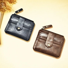 Detailed view of compact black and brown leather wallets with zippers and snap closures