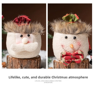 Detail of Santa and Snowman plush Christmas gift bags with bells and drawstring closure