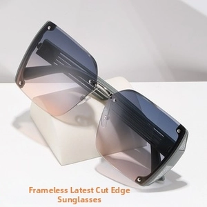 Detail of rimless gradient lenses with stylish diamond cut edges and silver temples