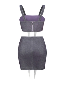 Detail of glittery purple-grey two-piece set with silver fringe and hidden zippers