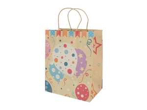 Detail of kraft paper gift bag with festive colorful balloons and stars patterns