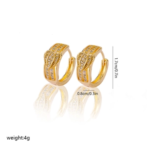 Detailed view of gold heart hoop earrings with dimensions 1.7cm by 0.8cm and cubic zirconia