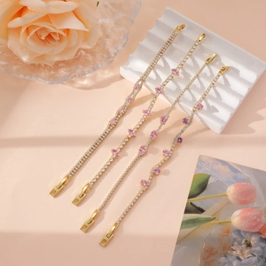 Luxurious adjustable gold tennis bracelet set with sparkling zircons and colored gemstones
