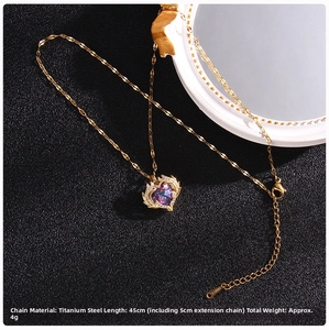 Detail view of purple heart crystal pendant with golden titanium steel chain necklace