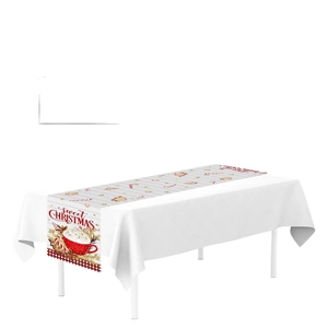 Christmas table runner with gingerbread men and Sweet Christmas mugs on wood background