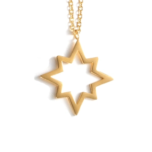 Minimalist gold stainless steel North Star pendant necklace with an octagonal star design