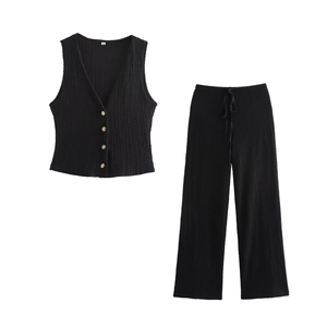 Flat lay of black two-piece set featuring V-neck buttoned vest and ribbed wide-leg pants