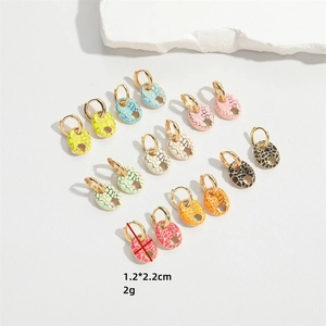 Oval enamel hoop earrings in eight vibrant colors including blue and yellow set