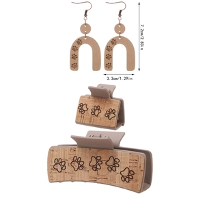 Detailed size view of wooden earring and hair clip set with printed paw pattern