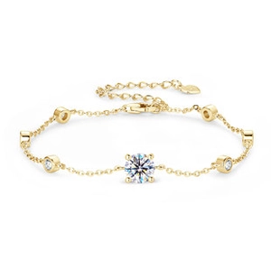 Detail of S925 sterling silver tennis bracelet with gold finish and heart charm