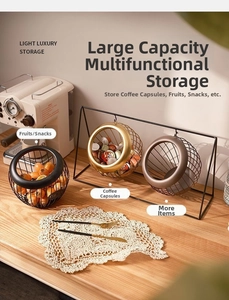 Close-up of black and gold iron wire tiered fruit basket and multi-functional storage rack