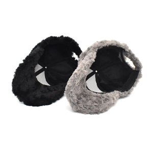 Detailed view of plush warm baseball hats with breathable mesh lining in black and gray