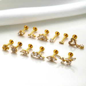 Set of 12 gold titanium piercing studs with zircon bee, flower and heart designs