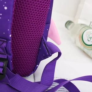 Detail of purple toddler backpack featuring breathable honeycomb mesh and reinforced stitching