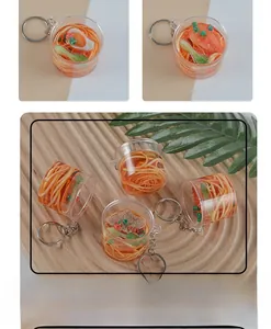 Macro detail of miniature beef noodle bowl keychain made of high-quality PVC material