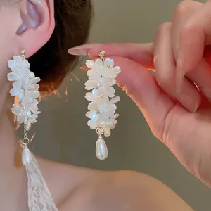 Elegant floral tassel earrings with white petals and pear-shaped pearls for women