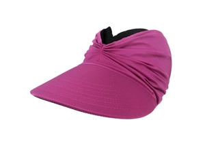 Detail of wide brim sun hat with pleated fuchsia fabric and black lining for UV protection
