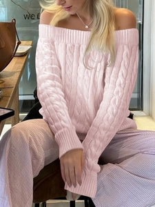 Pink off-the-shoulder knit sweater with cable stitch pattern and long sleeves