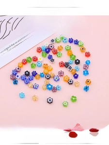 Macro shot of colorful millefiori glass flower beads for DIY handmade jewelry crafts