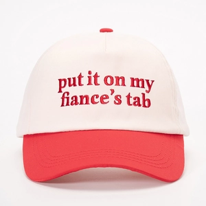 Two-tone cotton baseball cap in red and cream with Put it on my husband's tab embroidery
