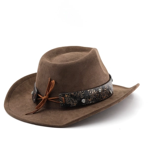 Detail of dark brown felt cowboy hat with paisley leather band and silver studs