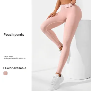 Pink high-waisted seamless yoga leggings with fitness print and peach lift effect