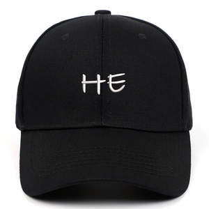 Classic black baseball cap featuring white HE letter embroidery with curved brim
