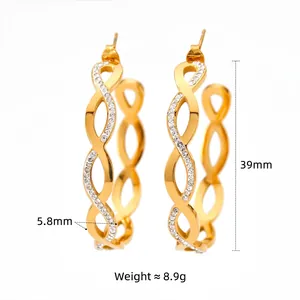 Golden C-shaped woven earrings with cubic zirconia, 39mm diameter and 8.9g weight