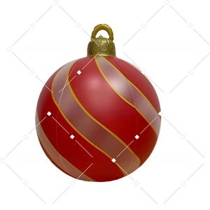 Detail of inflatable red Christmas ball with golden spiral patterns and hanging cap