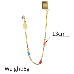 Detail view of gold chain ear cuff with colorful beads and dimension labels