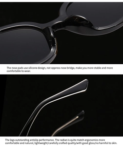 Detail view of glossy black cat-eye sunglasses with ergonomic non-slip temples and nose pads