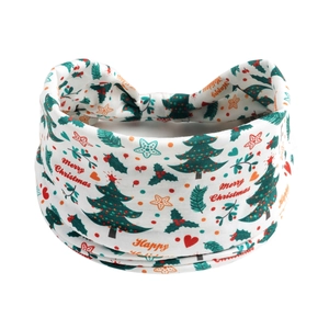 Detail of Christmas headband with festive Merry Christmas print and holiday patterns