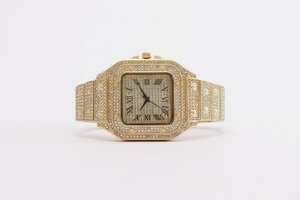 Detailed macro view of iced out golden square watch with micro-paved crystal diamonds