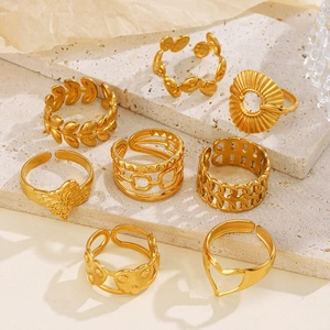 Eight-piece gold stainless steel heart and butterfly open ring set on stone base