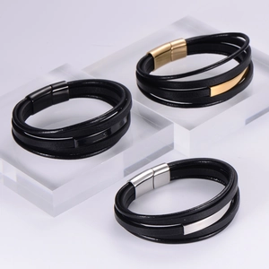 Detail of multi-layer leather bracelets with magnetic stainless steel clasps in three colors