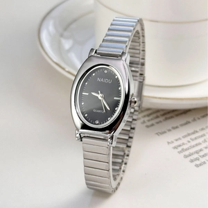 Elegant women's quartz watch with small oval black dial and silver elastic metal strap