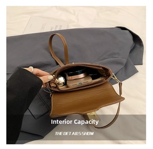 Internal capacity of the leopard print bucket bag showing phone, lipstick, and makeup