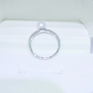 Elegant 6-7mm natural freshwater pearl ring in silver with sparkling zircon accents