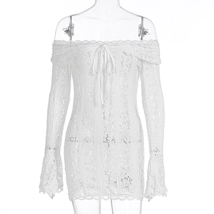 Detail of white lace mini dress with off-the-shoulder neckline and elegant bell sleeves