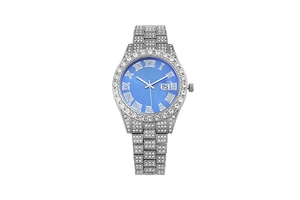 Detail of silver iced-out watch with navy blue dial, Roman numerals and date window