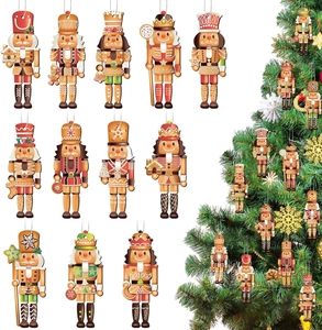 Set of wooden gingerbread nutcracker ornaments hanging on a Christmas tree