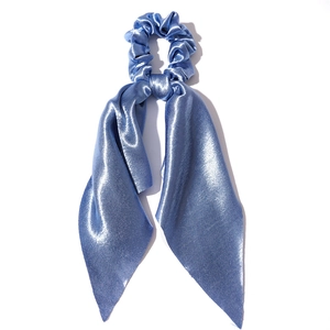 Blue satin scrunchie with long ribbons and a silky finish on a white background