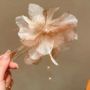 Elegant gold flower hair pin with translucent petals and long pearl tassels