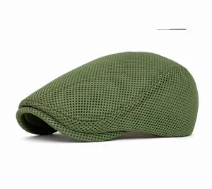 Close-up of the breathable mesh fabric texture on the light green duckbill beret hat