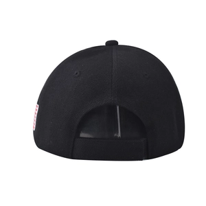 Rear view of black cotton baseball cap with American flag patch and adjustable strap
