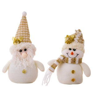 White Christmas plush snowman and Santa figurines with gold knit hats and sequin details