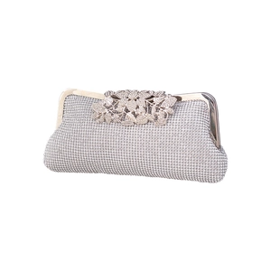 Elegant silver evening clutch bag with sparkling rhinestones and floral metal leaf clasp