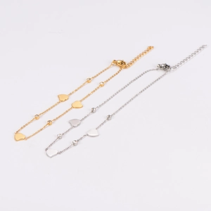 Bracelets de cheville élégants en acier doré et argenté avec cœurs et cristaux