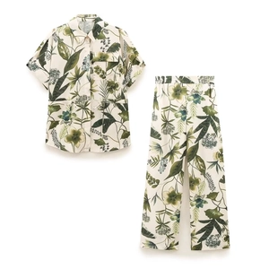 Women's tropical floral print two-piece set with short sleeve shirt and straight trousers