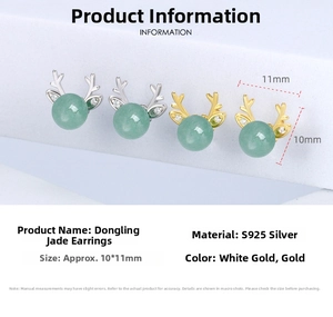 Detailed view of S925 silver reindeer earrings with green aventurine and zircon stones